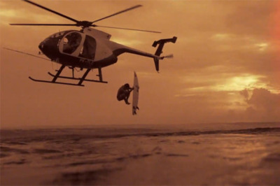 helicopter_launching_a_surfer_sunset_sunrise_ocean_surf